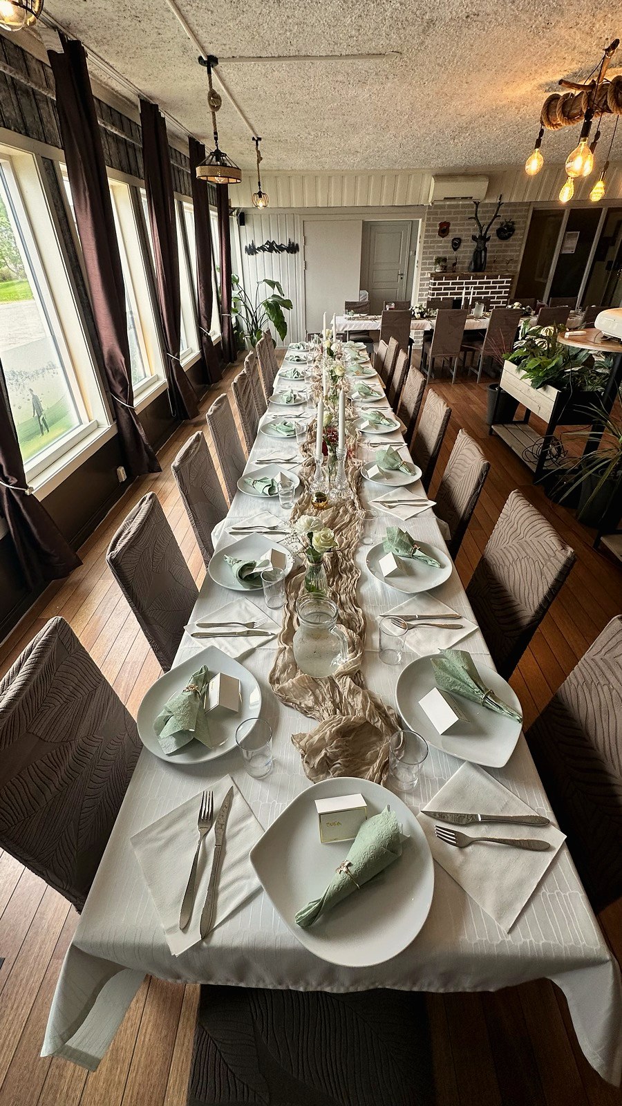 A nicely set table at Færingen Spiseri — Terråk Gjestegård, Bindal